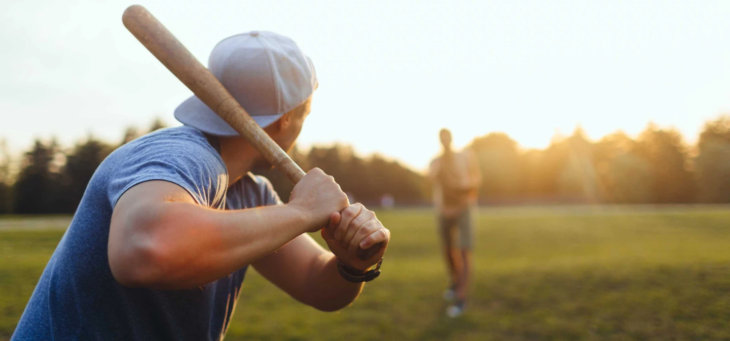 Rounders game with bat and ball