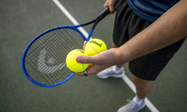Tennis racquet and balls